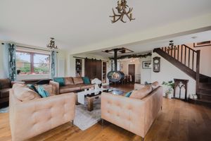 Open plan sitting room- click for photo gallery